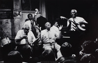 Willie Humphrey (center b. 1900) at Preservation Hall.  Narvin Kimball on banjo (b.1909).