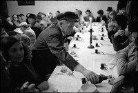 Passover Seder held in Warsaw's kosher kitchen. Mr. Czapnik pouring wine. 1979
