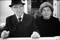 Mr. and Mrs. Abraham Fogel, after kiddush and Shabbat services in the Remu Synagogue. 1978