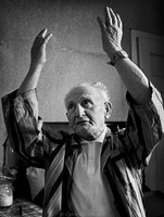 Singing the Yiddish song, "Who Will Say Kaddish* For Me?" 76-year-old Max Ramenstein of Przemysl bemoans his fate.  When this picture was made, there were approximately 50 Jews left in Przemysl. In 1939 there were about 20,000. 1975  *(Kaddish is the prayer of remembrance for the dead.) 