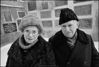 Mr. and Mrs. Abraham Fogel in the courtyard of the Remu Synagogue after Shabbat services. They lived through the Holocaust in Russia. 1979