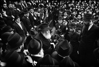 Menachem Mendel Schneerson, (1902-1994), known simply as the Rebbe, watched by his followers while making his entrance at Chabad-Lubavitch Headquarters in Brooklyn, NY. 