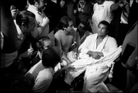 Muhammad Ali surrounded by international press.