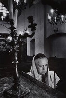 Abraham Fogel, the reader, at Krakow's Remu Synagogue.  The last of the rabbis fled in 1968.