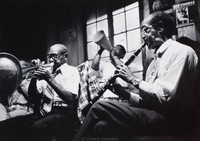 Paul Barnes (clarinet b. 1902), Alonzo Stewart (drums w/megaphone), Kid Thomas (trumpet b. 1896).