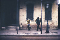 Anthony "Tuba Fats" Lacen and his assistant walking down Royal Street after a gig.