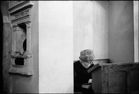 Mrs. Abraham Fogel, the only woman at Shabbat services in the Remu Synagogue. 1978
