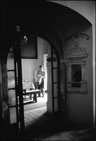 Adam Szmer cleaning up after kiddush in the Remu Synagogue. 1979