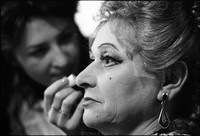Actress Stefania Staszewska (1923-2004) receiving make-up in a backstage dressing room, Yiddish Theater, Warsaw, 1980.