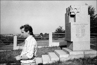 Jerzy Kichler, 36, at the monument he and his recently deceased father, Nesaniel, built in Wielicka (14 km. sw of Krakow). Built in 1980 with mostly their own money, the monument stands on the site of a mass grave where over 1000 people were killed. It took 2 years to complete. 1983