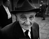 83-year-old Dr. Hieronim Krug, the oldest living advocate (lawyer) in Krakow, in the courtyard of the Remu Synagogue awaiting Friday night services. Like many Polish Jews, Krug survived the Holocaust by escaping east to Russia. 1975