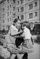 Jozef Herzl, Polish Jew, with daughters outside their apartment block in Krakow. Herzl's wife is not Jewish. 1983