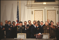 U.S. President Jimmy Carter and Soviet General Secretary Leonid Brezhnev "sealing the deal" after signing the SALT II agreement (Strategic Arms Limitation Treaty) in Vienna, Austria.