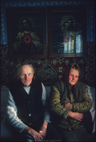 Farm couple on their bed. Raciborsko, Poland 1979