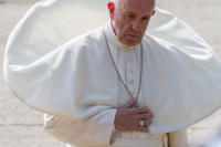 Pope Francis during silent prayer at Auschwitz-Birkenau concentration camp.