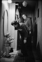 Lech Walesa with one of his children, daughter Magdalena, in his apartment before leaving for work. Gdansk, Poland December 1980.