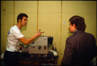 Lech Walesa conversing with printing press man Sylwester Niezgoda  at Solidarity headquarters, Gdansk, Poland, Dec 1980