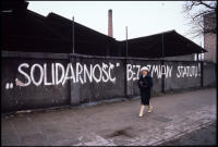 Street scene with Solidarity graffiti which reads "'Solidarity' Without changing the statute!", Gdansk, Poland Dec. 1980