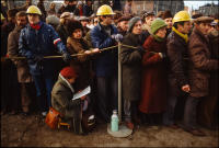 Crowd waiting for the official opening of the Monument to the Fallen Shipyard Workers of 1970, to take place that night, Gdansk, Poland