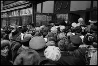 Crowd of people anxious to get into opening food store, Gdansk, Poland, December 1980