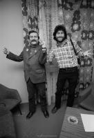 Polish Solidarity trade union president Lech Walesa (l) joking with American photographer Chuck Fishman (r) in Walesa's office at Solidarity headquarters in Gdansk, Poland, Dec 1980. Photograph © Arnaud de Wildenberg.