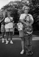 Local residents watching the burning smoke from the collapsed Twin Towers of the World Trade Center, 37 miles away, from a mountain in Rockland County, NY,  Sept. 11, 2001