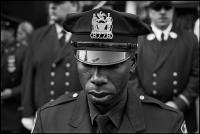 New York police officers at the second anniversary of the attack at the World Trade Center at Ground Zero, NY, NY, Sept. 11, 2003